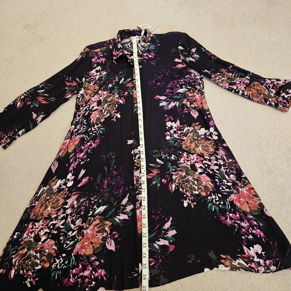 Cute, Cupio long sleeved purple floral dress. In size medium.